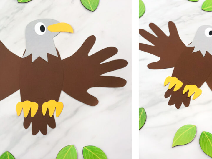 Paper craft of an eagle made from brown, yellow, and gray paper. The wings and tail resemble handprints. It is displayed on a white marble surface surrounded by green paper leaves.