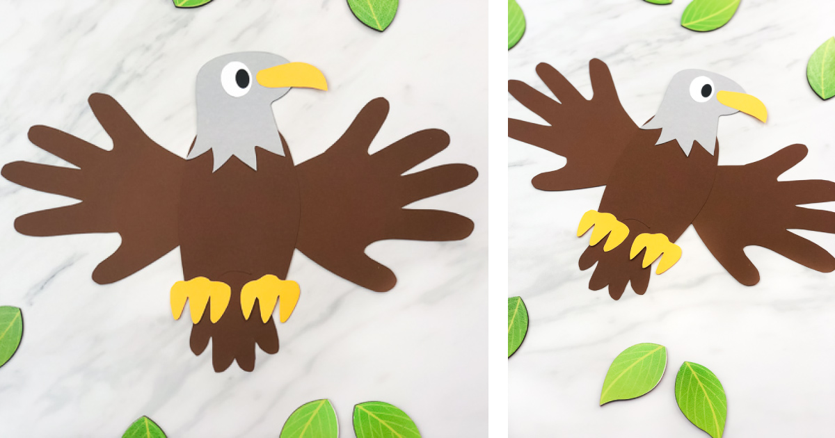 Paper craft of an eagle made from brown, yellow, and gray paper. The wings and tail resemble handprints. It is displayed on a white marble surface surrounded by green paper leaves.