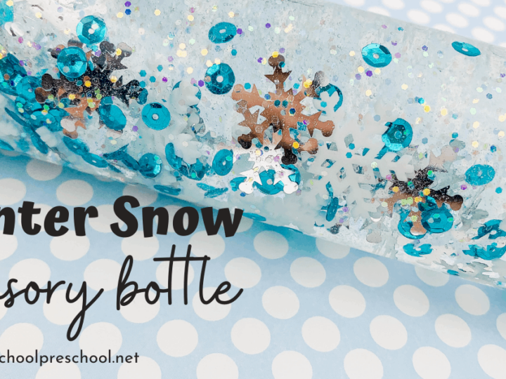 A clear sensory bottle filled with water, blue sequins, silver snowflakes, and glitter. The words Winter Snow sensory bottle are written on the image. The background is a white polka dot pattern on a light blue surface.