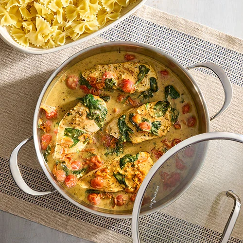 Pampered Chef 4.5-Qt. Stainless Steel Sauté Pan with creamy chicken and pasta