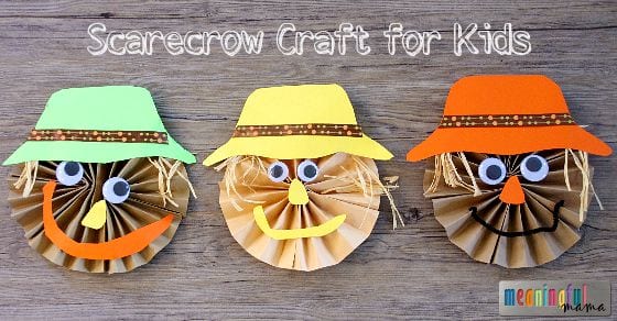 Pinwheel scarecrow paper craft with raffia hair, googly eyes and a paper hat