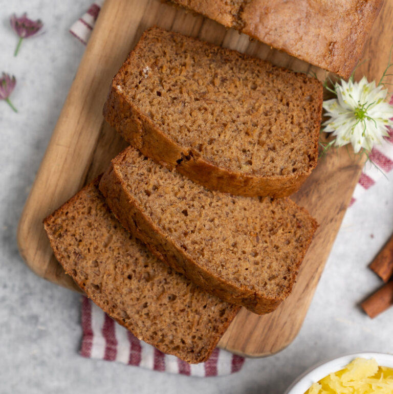 Sliced loaf of vegan spaghetti squash bread with cinnamon and cardamom