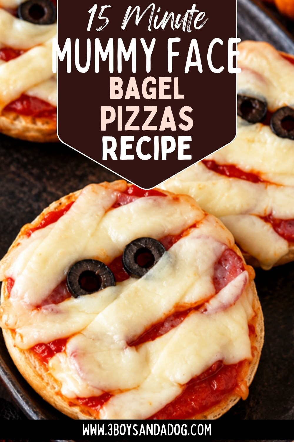 Mummy face pizzas on bagel halves with string cheese bandages and black olive eyes, with text reading 15 Minute Mummy Face Bagel Pizzas Recipe