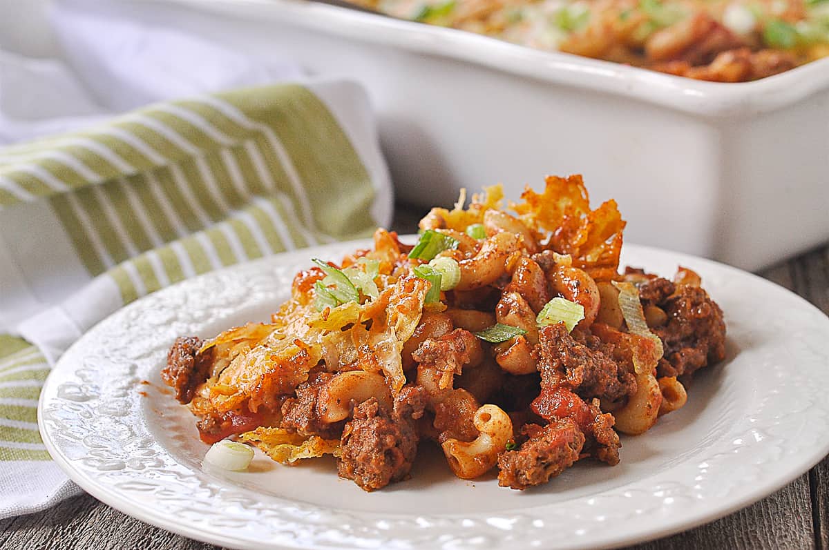 Taco pasta bake with ground beef, macaroni and melted cheese in a 9x13 pan