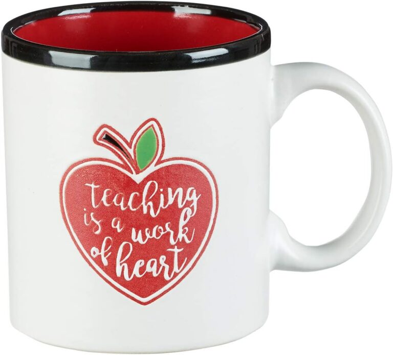 White Teaching is a Work of Heart coffee mug with a red heart apple