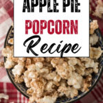 Overhead view of apple pie popcorn in a blue bowl on a red checked towel with the words No-Bake Apple Pie Popcorn Recipe