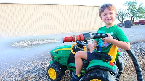Hudson's Playground, a boy driving a tractor on his family farm