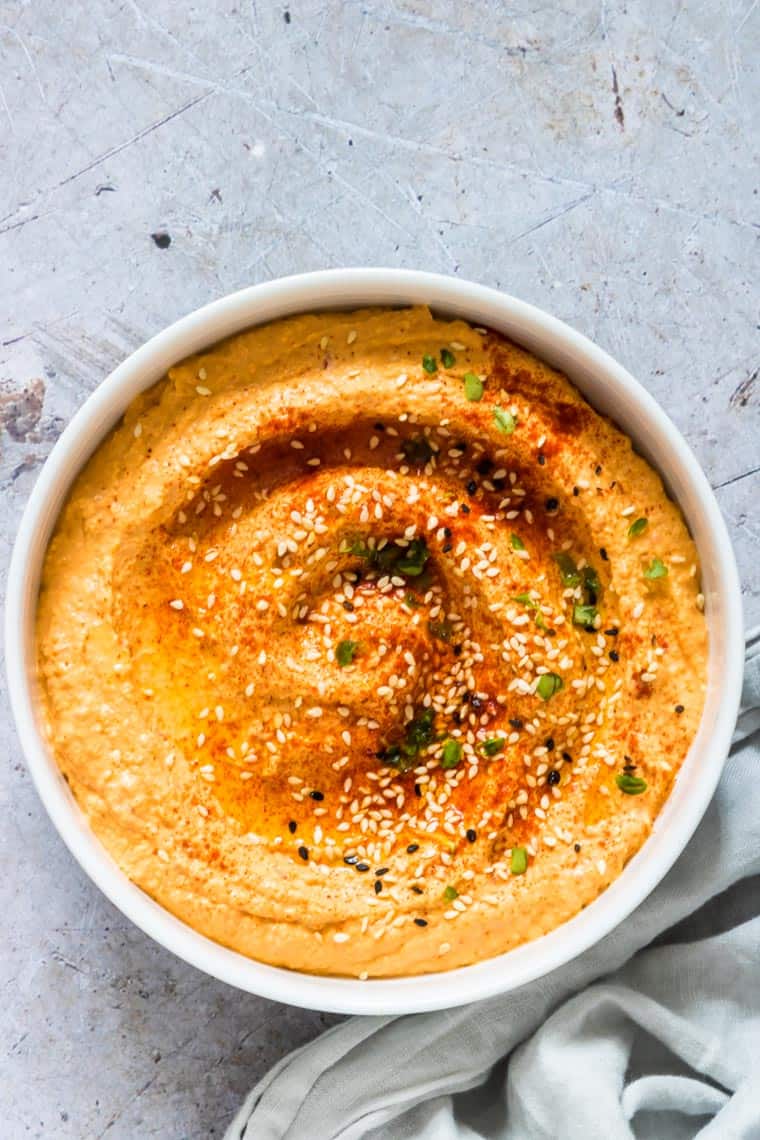 Bowl of Instant Pot pumpkin hummus for a fall dip platter